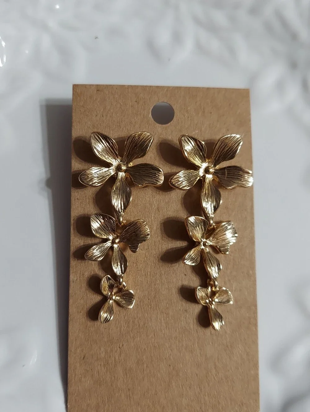 Textured Gold Tone/Dogwood Flower Trio Drop Earrings